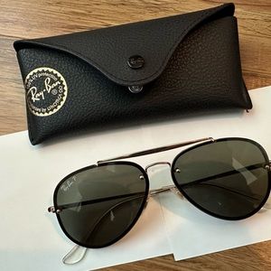 Ray- Ban aviator sunglasses with case.